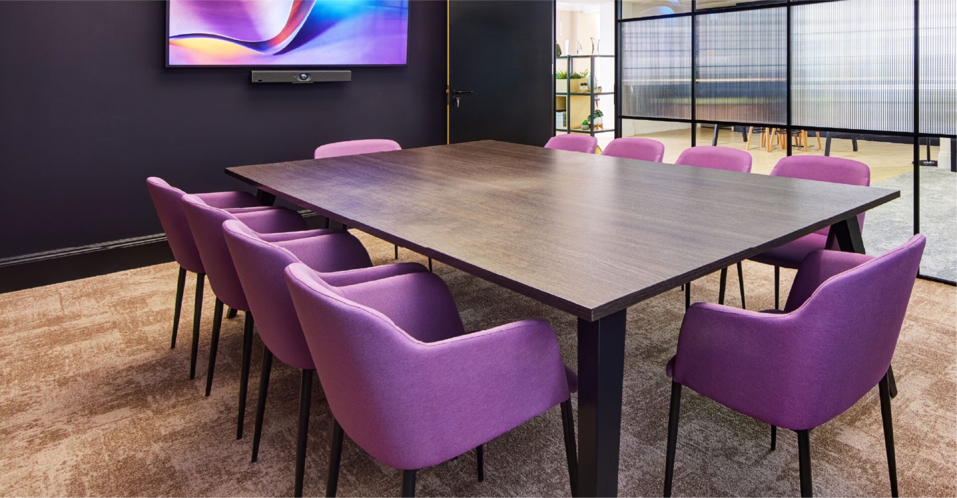 Meeting room with purple chairs