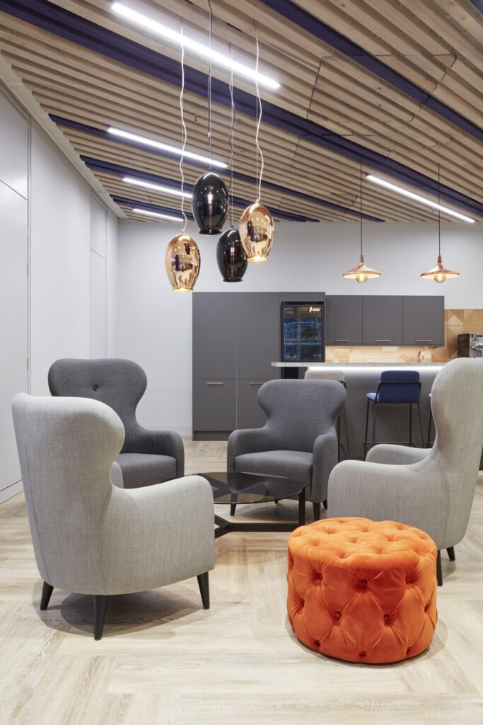 Lounge seating beneath pendant lights